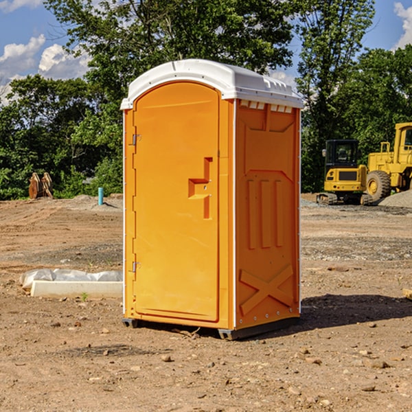 what is the cost difference between standard and deluxe portable restroom rentals in Orchard